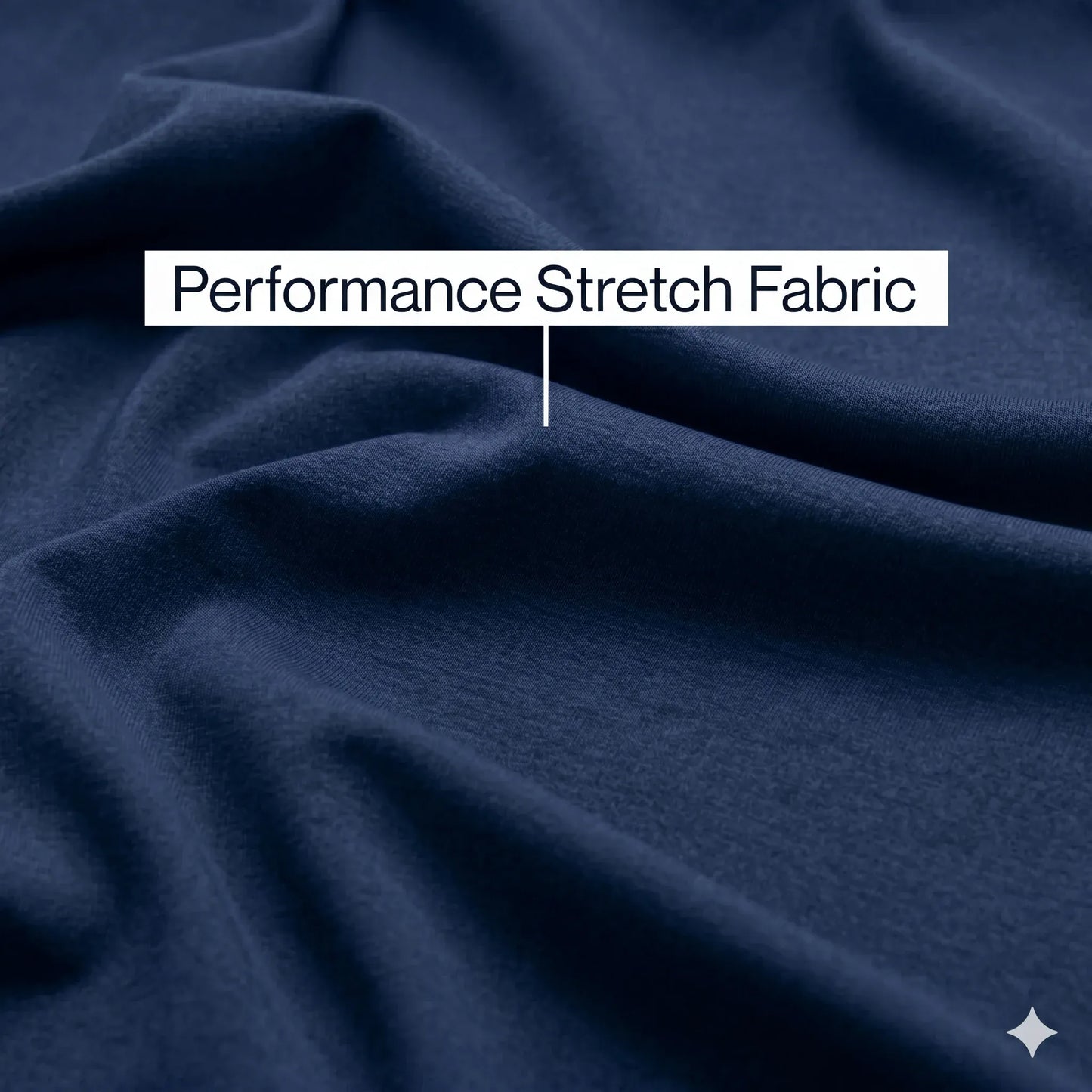 Close-up of blue fabric labeled 'Performance Stretch Fabric'. #Navy