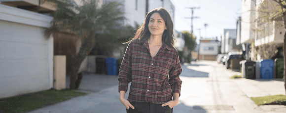 woman wearing Joe & Bella's flannel shirt with magnetic buttons