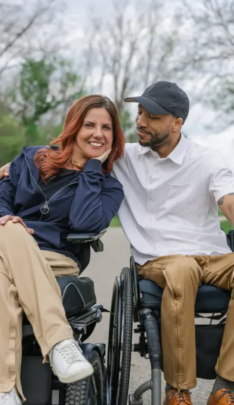 man and woman in wheelchair wearing joe & bella adaptive clothing