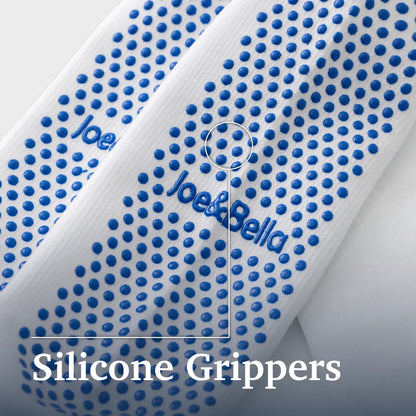 Close-up of a white textured strap or band with repeated blue silicone grippers and blue 'Joe&Bella' branding, plus large text reading 'Silicone Grippers' at the bottom. Joe & Bella Big-Grip No-Slip Compression Socks: 3-Pack #White