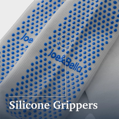 White textured strap with blue silicone grip dots and blue 'Joe & Bella' branding, shown close up with the text 'Silicone Grippers' overlaid at the bottom. Joe & Bella Big-Grip No-Slip Compression Socks: 3-Pack #Grey
