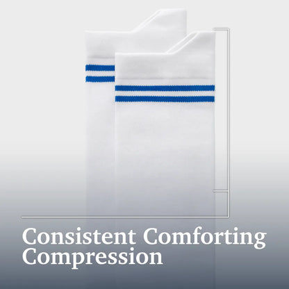 A pair of white compression socks with two blue stripes near the top, shown against a light gray gradient background with the text 'Consistent Comforting Compression' at the bottom. Joe & Bella Big-Grip No-Slip Compression Socks: 3-Pack #White