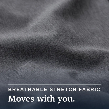 Close-up of dark gray stretch fabric with soft folds and overlaid text reading 'BREATHABLE STRETCH FABRIC Moves with you.' | Tailored-Fit #Heathered Grey