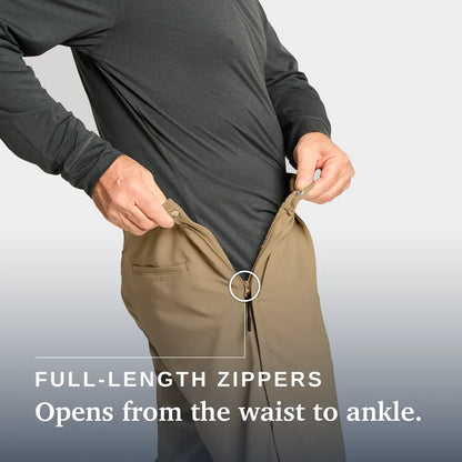 A person wearing a dark gray long-sleeve shirt and tan pants is demonstrating a full-length zipper on the pants, with text reading 'FULL-LENGTH ZIPPERS Opens from the waist to ankle.'. Joe & Bella Dark Khaki / S Everyday Side-Zip Pants for Men #Dark Khaki