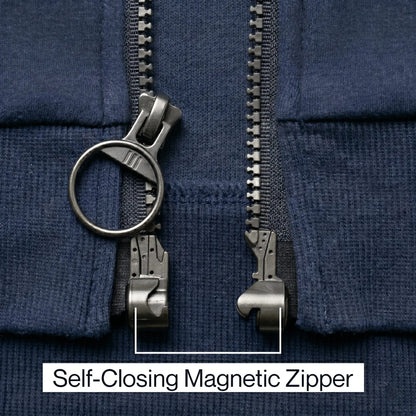Close-up of a self-closing magnetic zipper on a navy blue fabric background. #Navy