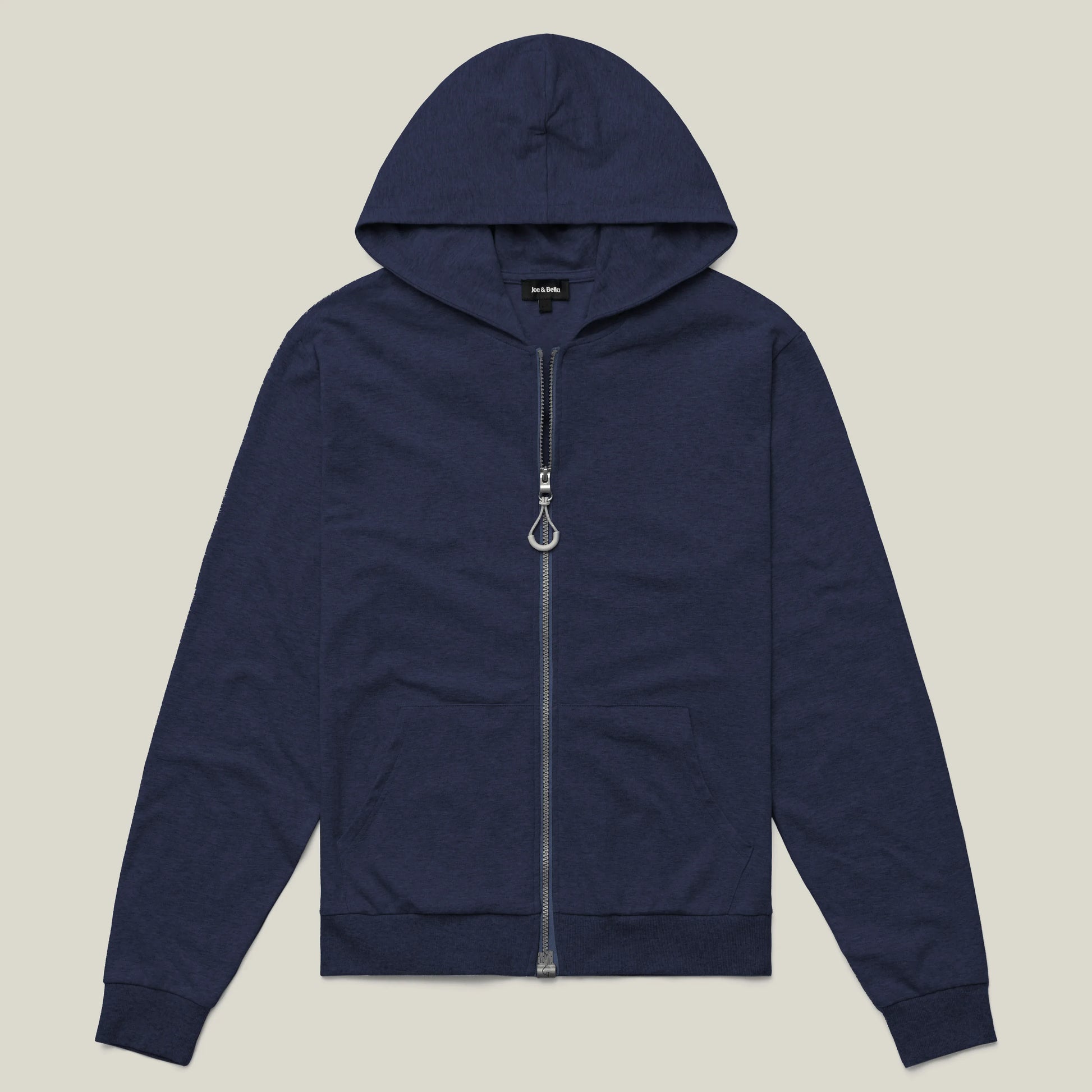 ["Navy blue hoodie with a zipper on a beige background ", "Navy"]