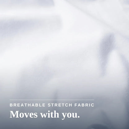 White textured fabric with soft folds and overlaid text reading 'BREATHABLE STRETCH FABRIC' and 'Moves with you.' Joe & Bella Magnetic Button-Down for Men | Relaxed-Fit #White