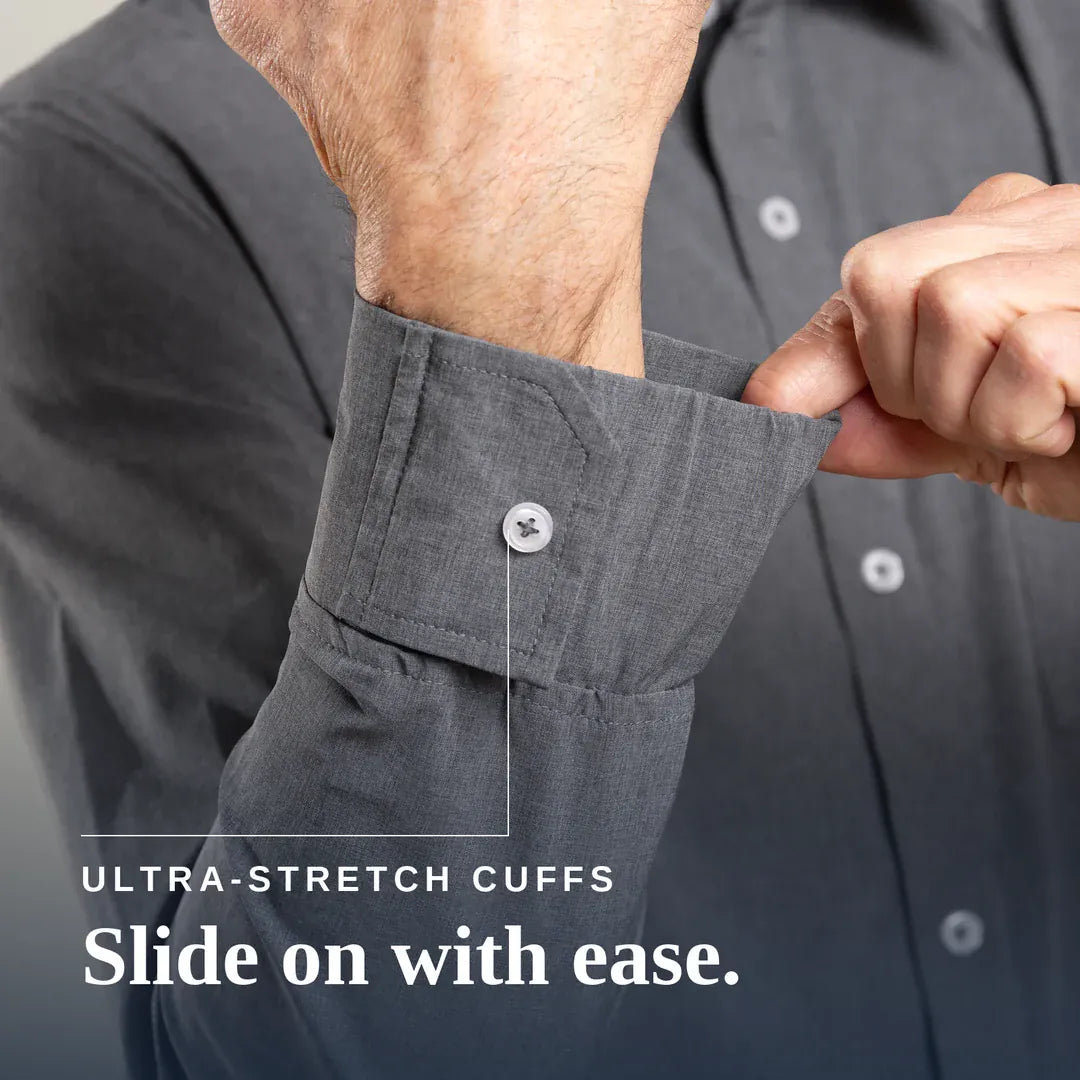 Close-up of a person's hands adjusting the cuff of a dark gray button-down shirt, with text reading 'ULTRA-STRETCH CUFFS Slide on with ease.'. Joe & Bella Everyday Magnetic Button-Down for Men | Relaxed-Fit #Heathered Grey