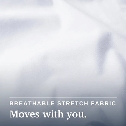 White textured fabric with soft folds and overlaid text reading 'BREATHABLE STRETCH FABRIC' and 'Moves with you.' Joe & Bella Magnetic Button-Down for Men | Relaxed-Fit #White