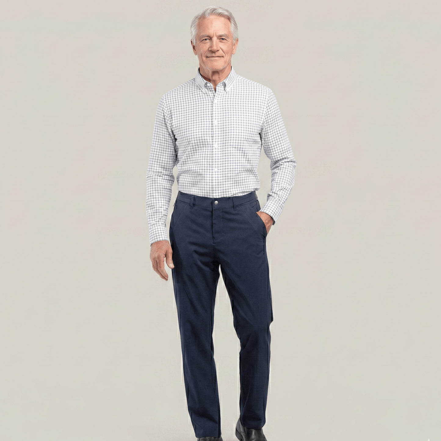 Man wearing a checkered shirt and navy pants on a beige background #Navy