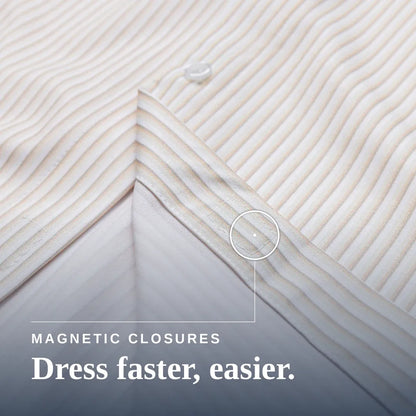 Close-up of a striped bedding fabric corner with a circular callout pointing to a magnetic closure, plus the text 'MAGNETIC CLOSURES Dress faster, easier.' #Tan Stripe