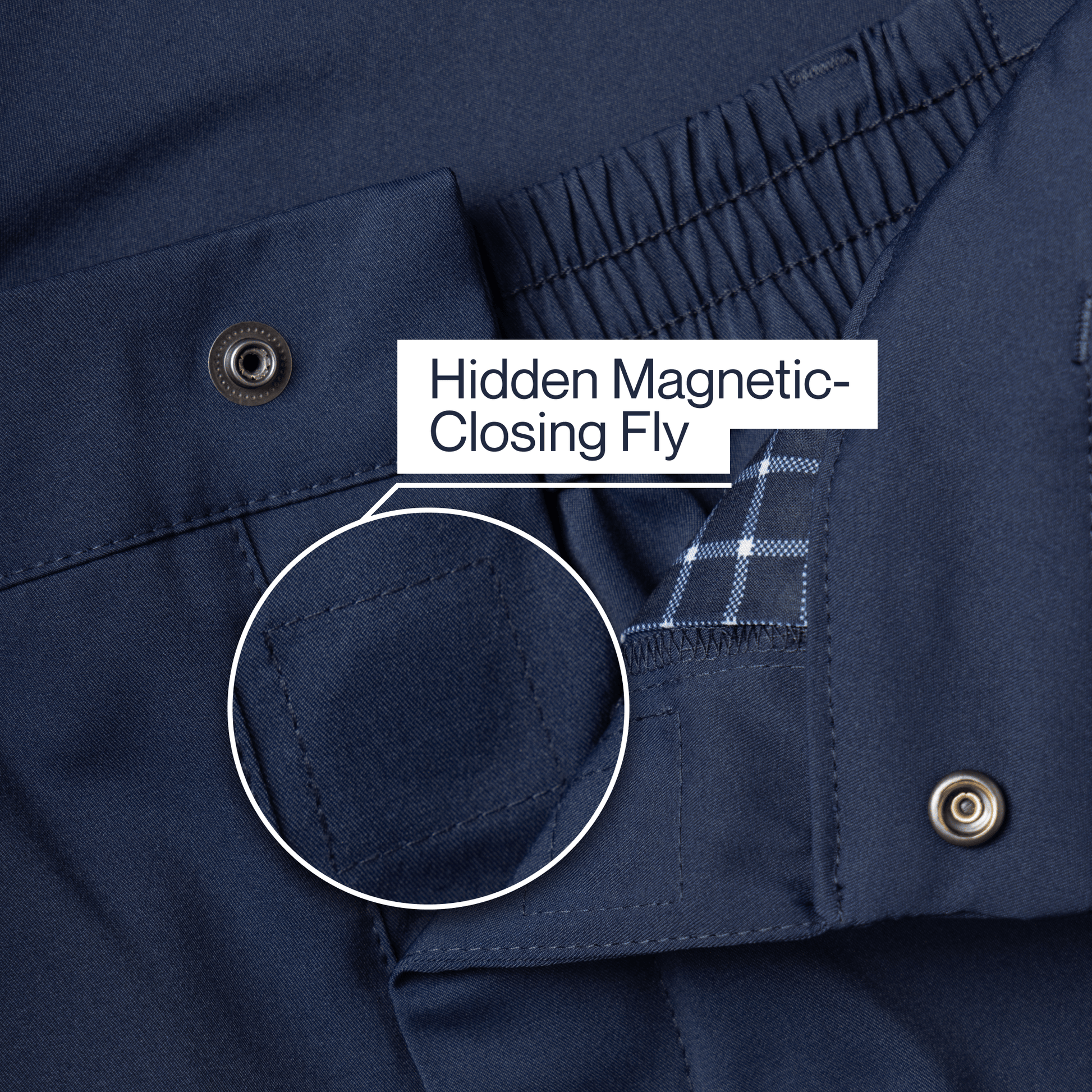["Navy blue pants with a hidden magnetic closing fly feature highlighted. ", "Navy"]