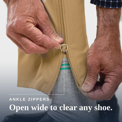 Close-up of a person's hands demonstrating an ankle zipper on a tan garment, with text reading 'ANKLE ZIPPERS Open wide to clear any shoe.'. Joe & Bella Signature Side-Zip Chinos for Men #Khaki