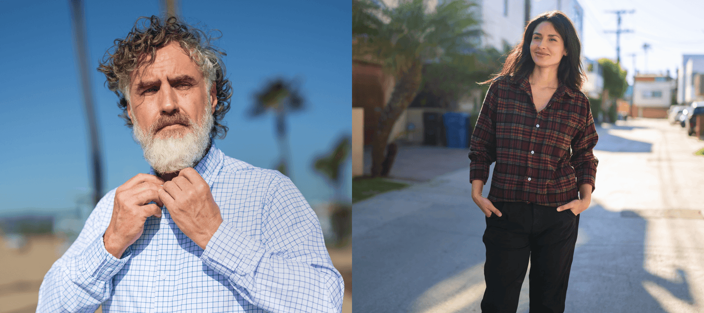 Two people, one with a beard and an adaptive checkered shirt, the other in an adaptive plaid shirt and dark pants, outdoors.